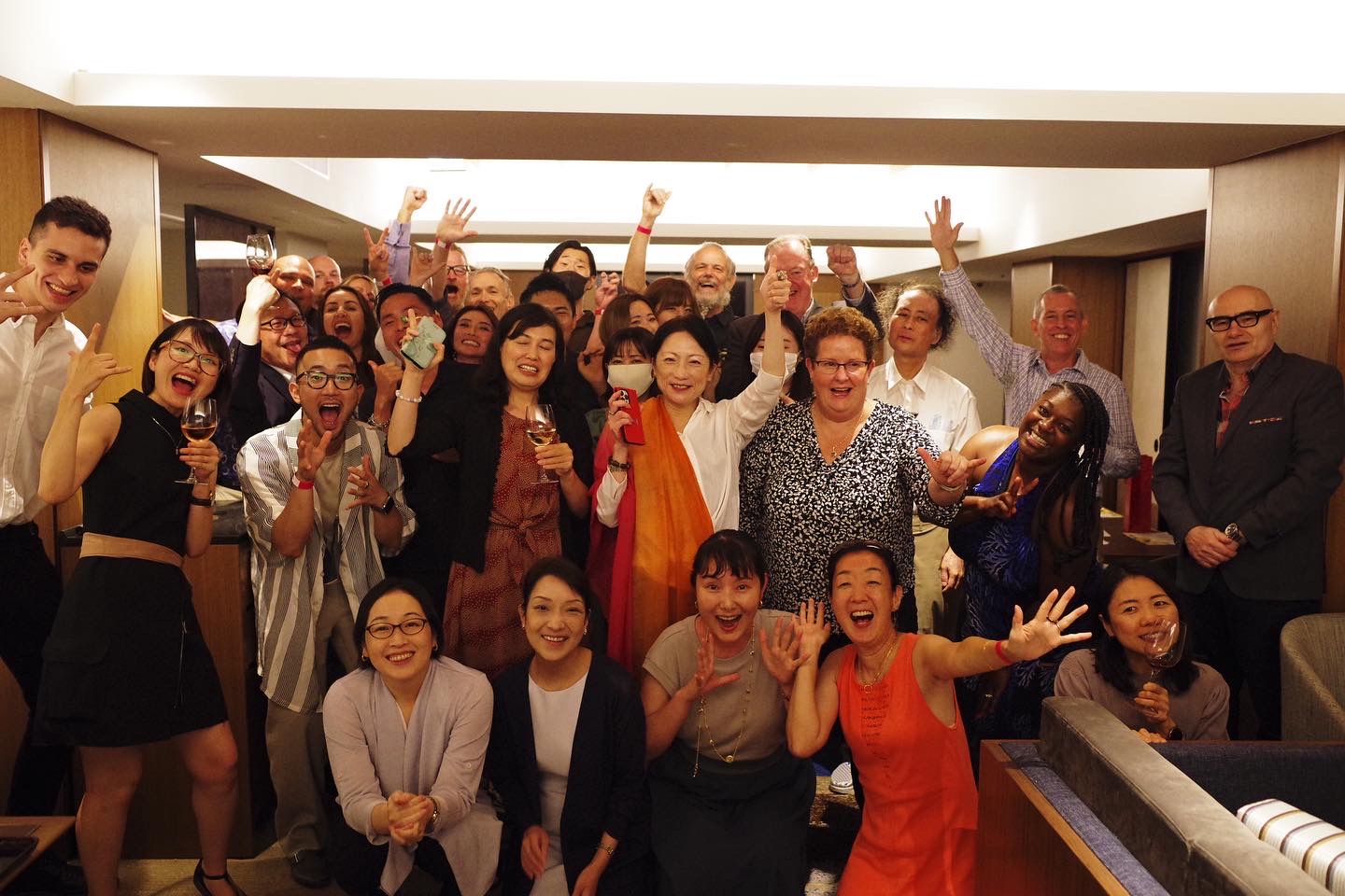 Tokyo Wine Events group gathered together with wine glasses
